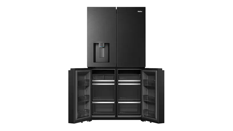 Front view of a black four-door refrigerator with the lower freezer doors open, showing multi-tier freezer drawers and bins Front view of a black four-door refrigerator with the lower freezer doors open, showing multi-tier freezer drawers and bins