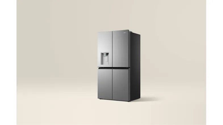 Front-angled view of a silver four-door refrigerator with a water dispenser Front-angled view of a silver four-door refrigerator with a water dispenser