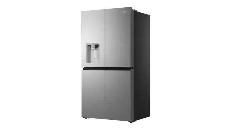 Front-angled view of a silver four-door refrigerator with an integrated water dispenser and brushed finish Front-angled view of a silver four-door refrigerator with an integrated water dispenser and brushed finish