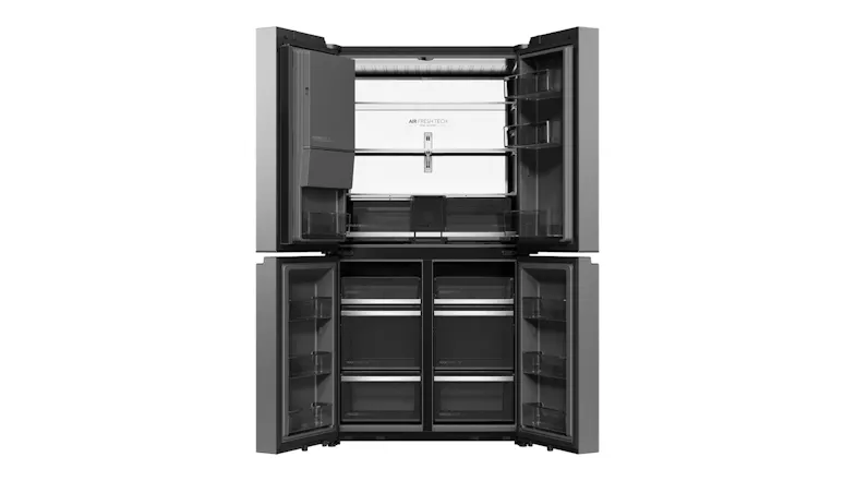 Interior front view of a silver four-door refrigerator with open fridge and freezer compartments Interior front view of a silver four-door refrigerator with open fridge and freezer compartments