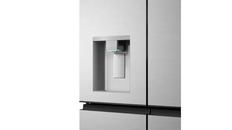 Close-up front view of a silver refrigerator water dispenser with an integrated control panel and dispenser lever Close-up front view of a silver refrigerator water dispenser with an integrated control panel and dispenser lever