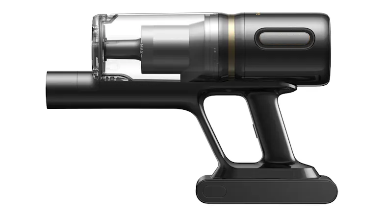 Side view of vacuum highlighting nozzle and grip texture Side view of vacuum highlighting nozzle and grip texture