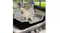 Lifestyle image showing a dog seated inside the booster seat installed on a vehicle seat using the adjustable straps Lifestyle image showing a dog seated inside the booster seat installed on a vehicle seat using the adjustable straps