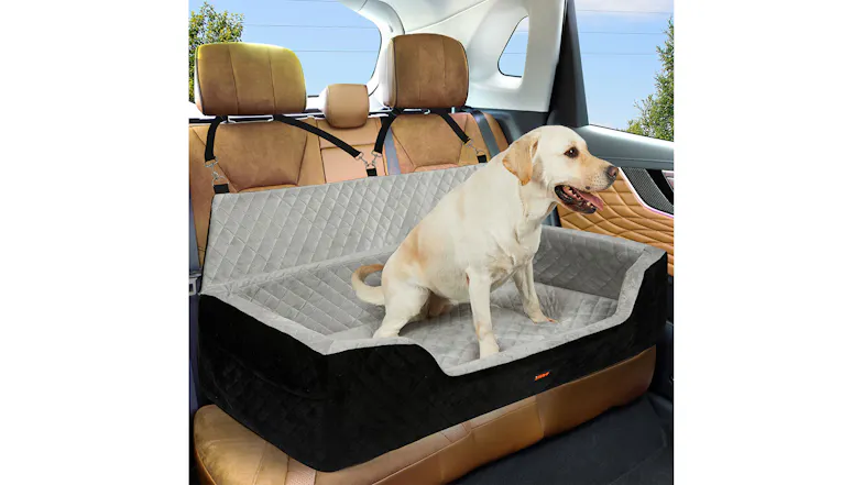 Pet booster seat fitted inside a car with a dog sitting comfortably, demonstrating elevated travel support Pet booster seat fitted inside a car with a dog sitting comfortably, demonstrating elevated travel support