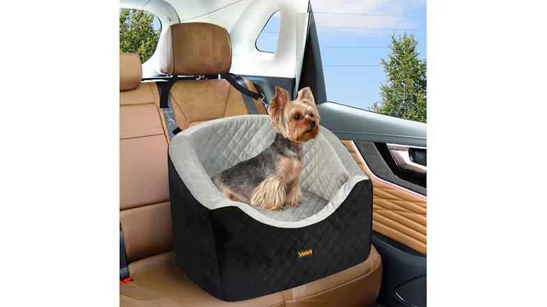 Pet booster seat fitted inside a car with a dog sitting comfortably, demonstrating elevated travel support Pet booster seat fitted inside a car with a dog sitting comfortably, demonstrating elevated travel support
