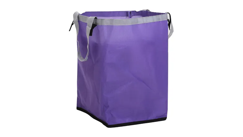 A left-angled view of a purple removable shopping cart bag with carry handle A left-angled view of a purple removable shopping cart bag with carry handle