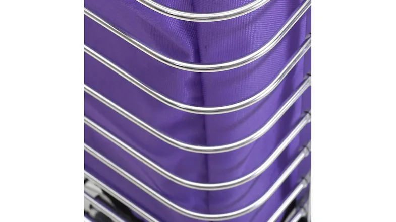 A close-up view of a purple fabric basket with chrome wire frame detail A close-up view of a purple fabric basket with chrome wire frame detail