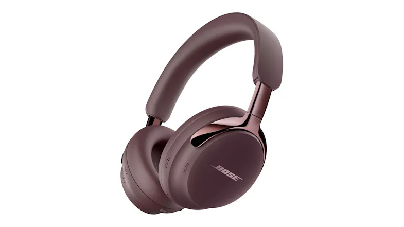 Angled left view of the Bose QuietComfort Ultra (2nd Gen) Active Noise Cancelling Wireless Over-Ear Headphones in Cherry Chocolate finish Angled left view of the Bose QuietComfort Ultra (2nd Gen) Active Noise Cancelling Wireless Over-Ear Headphones in Cherry Chocolate finish