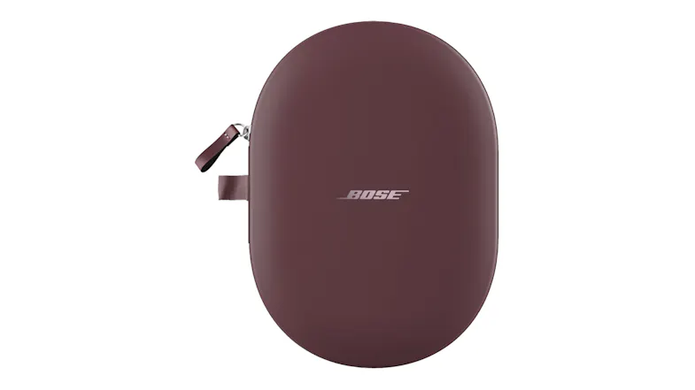 Oval-shaped hard carrying case for headphones, standing upright Oval-shaped hard carrying case for headphones, standing upright