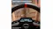 Close-up view of a Thrustmaster T248 racing wheel display, black rim with a red centre marker, and digital dashboard Close-up view of a Thrustmaster T248 racing wheel display, black rim with a red centre marker, and digital dashboard