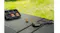 A SanDisk Extreme GO microSD card, complete with a card case and a USB-C card reader, resting on a black outdoor surface A SanDisk Extreme GO microSD card, complete with a card case and a USB-C card reader, resting on a black outdoor surface