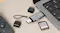 ALOGIC dual-interface card reader connected to a laptop, with an inserted microSD card and an SD card beside it ALOGIC dual-interface card reader connected to a laptop, with an inserted microSD card and an SD card beside it