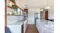 Modern kitchen with two white ceiling cassette rangehood modules installed above counter Modern kitchen with two white ceiling cassette rangehood modules installed above counter