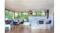Full view of open-plan kitchen and dining space with flush-mounted ceiling rangehoods Full view of open-plan kitchen and dining space with flush-mounted ceiling rangehoods
