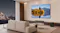 Rear-angle view of a TCL home theatre setup with a wall-mounted TV, soundbar, wireless speakers, and subwoofer Rear-angle view of a TCL home theatre setup with a wall-mounted TV, soundbar, wireless speakers, and subwoofer