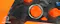 Close-up banner image of an orange D-pad on a camouflage gaming controller, highlighting its built-in audio controls Close-up banner image of an orange D-pad on a camouflage gaming controller, highlighting its built-in audio controls