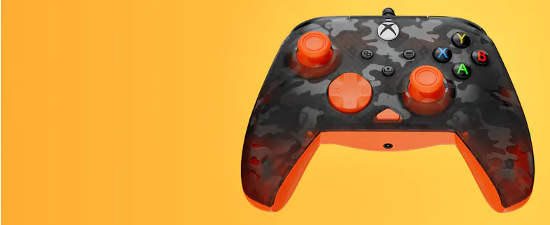 Front view of a camouflage-patterned Turtle Beach wired Xbox controller with bright orange accents, set against a solid orange background Front view of a camouflage-patterned Turtle Beach wired Xbox controller with bright orange accents, set against a solid orange background