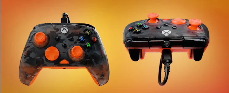 Front and angled top views of a camouflage Turtle Beach wired Xbox controller with orange thumbsticks, displayed on a warm-toned background Front and angled top views of a camouflage Turtle Beach wired Xbox controller with orange thumbsticks, displayed on a warm-toned background