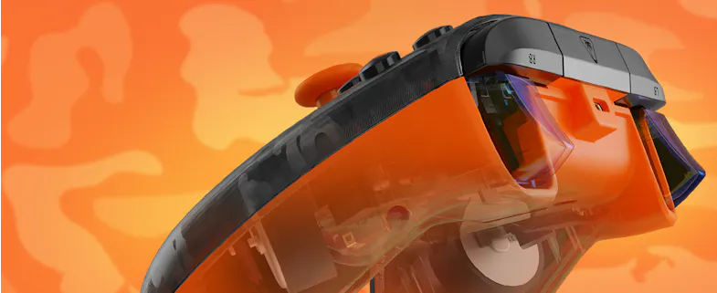 Close-up banner showing a semi-transparent view of an orange Turtle Beach controller, highlighting its internal components Close-up banner showing a semi-transparent view of an orange Turtle Beach controller, highlighting its internal components