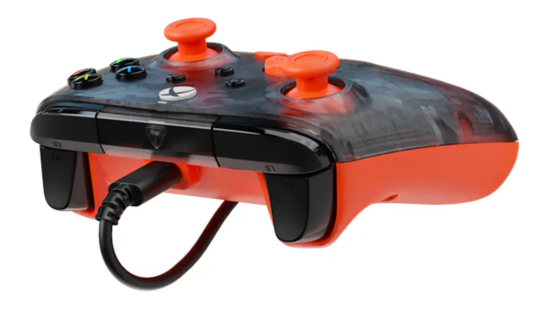 Angled top view of a camouflage Turtle Beach wired Xbox controller with bright orange thumbsticks and a connected black cable Angled top view of a camouflage Turtle Beach wired Xbox controller with bright orange thumbsticks and a connected black cable