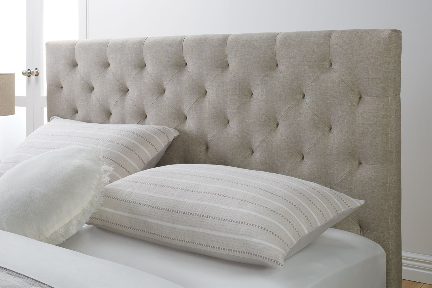 White linen store queen headboard