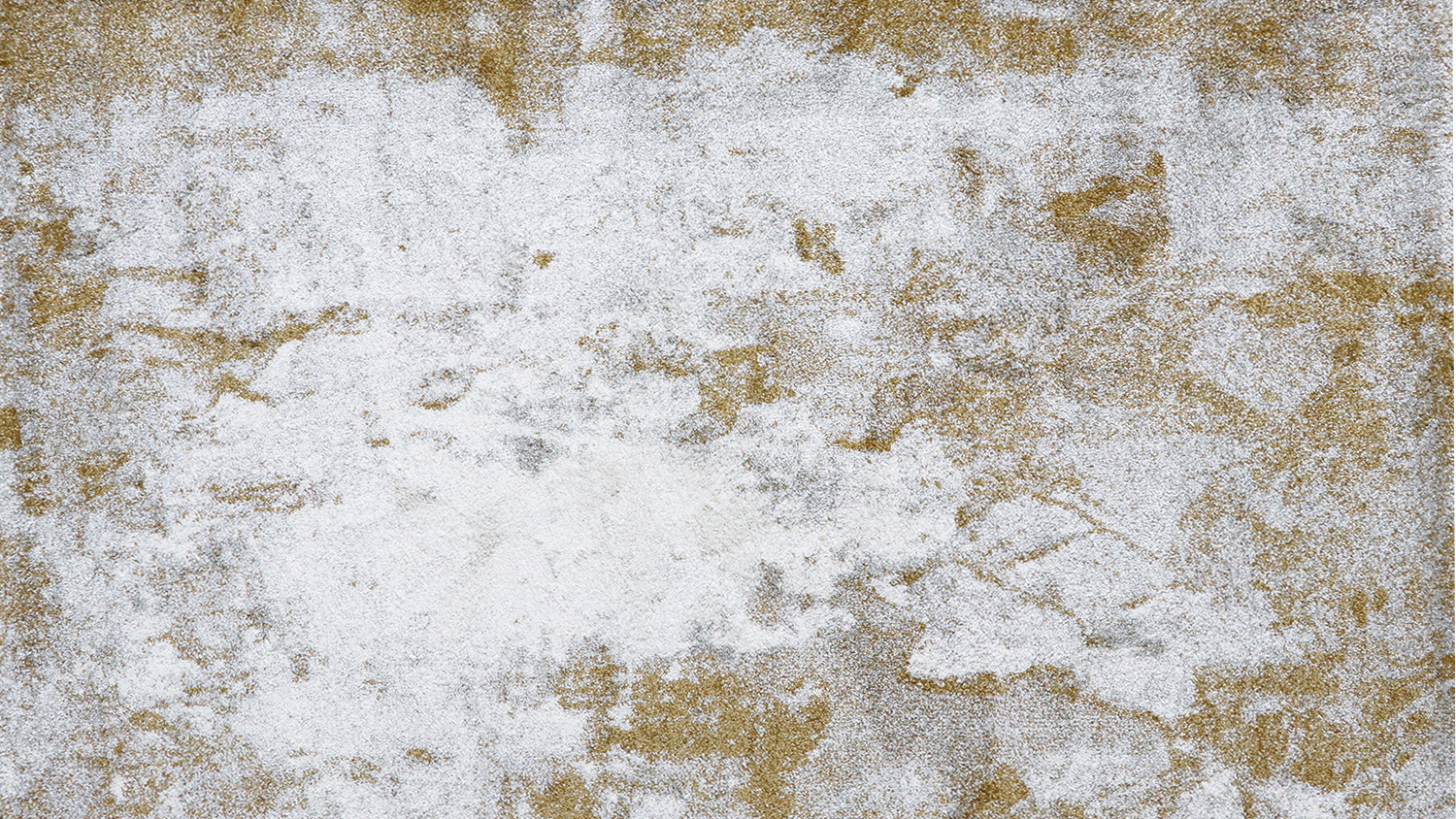 A flat-lay view of a distressed-style rug.