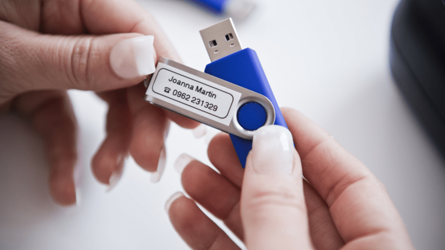 Brother PTH110 Portable Label Maker - White