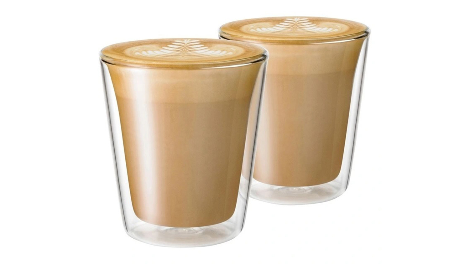 A front-view of two double-walled glass cups filled with lattes.