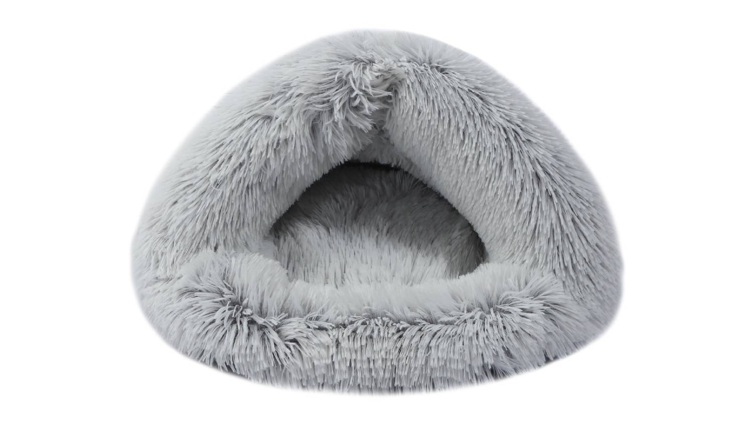 A white shaggy faux fur cat igloo with a cave-like structure and front opening.