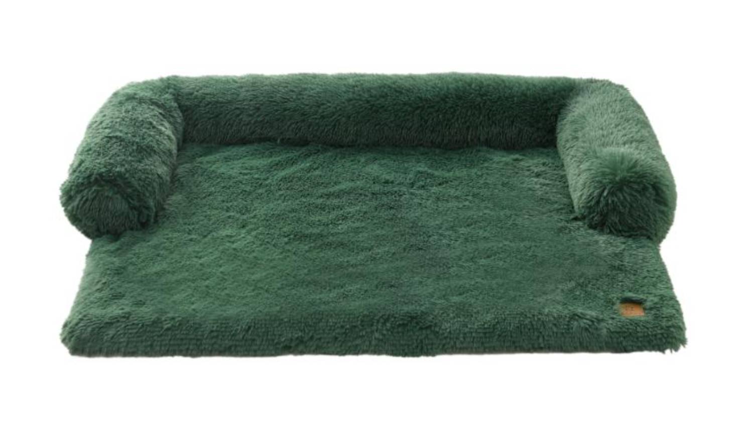 An angled view of Charlie's Faux fur sofa protector in eden green colour