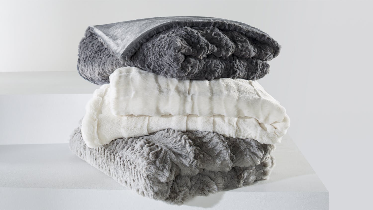 Glacier Carved Brushed Faux Fur Throw by Top Drawer