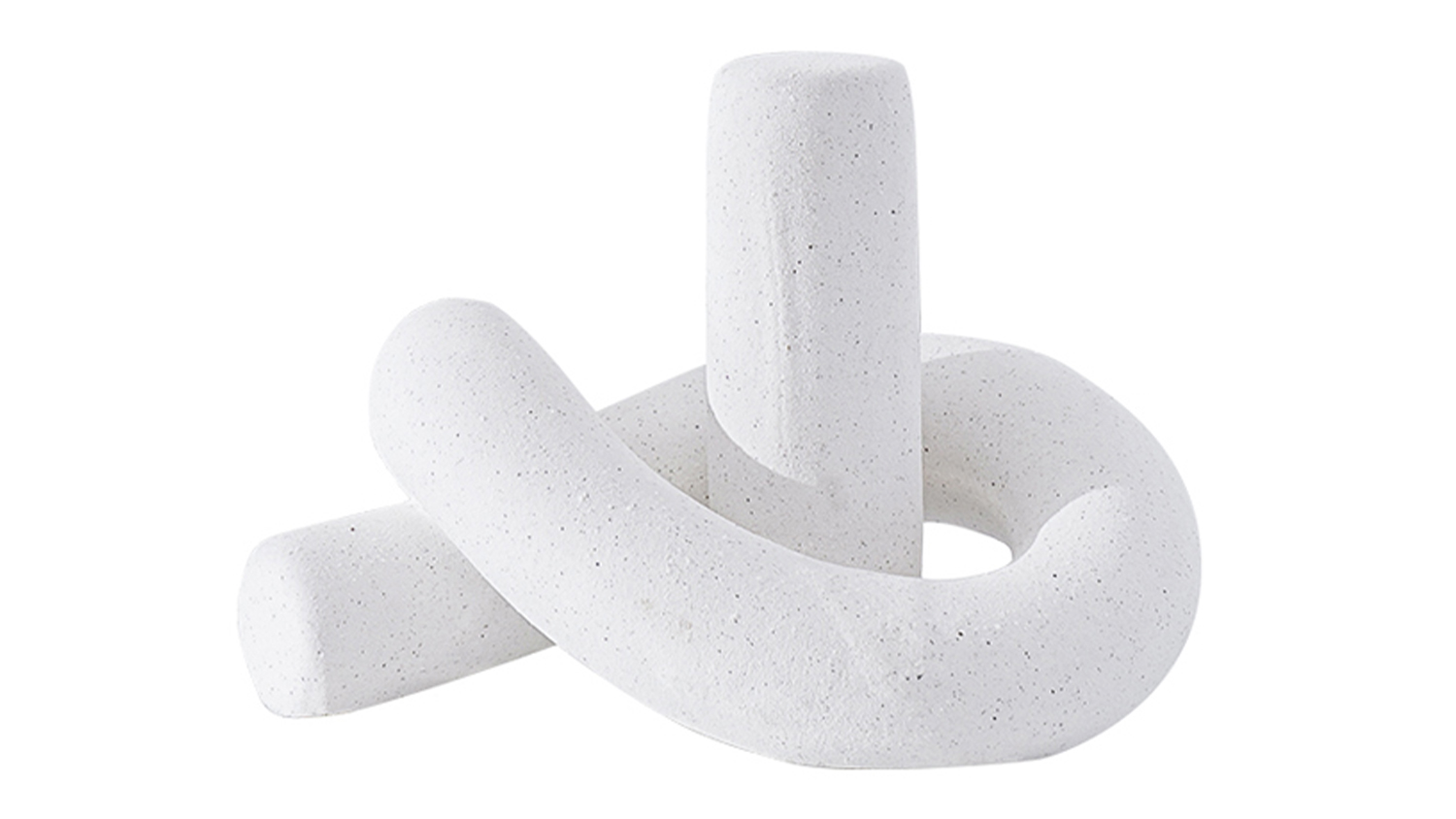 A close-up of a white decorative knot with a textured, speckled finish.