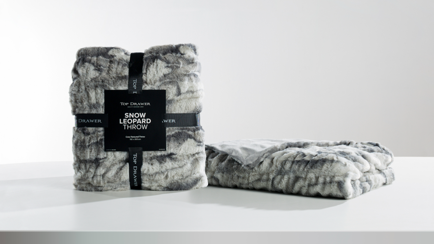 Snow Leopard Grey Faux Fur Throw by Top Drawer