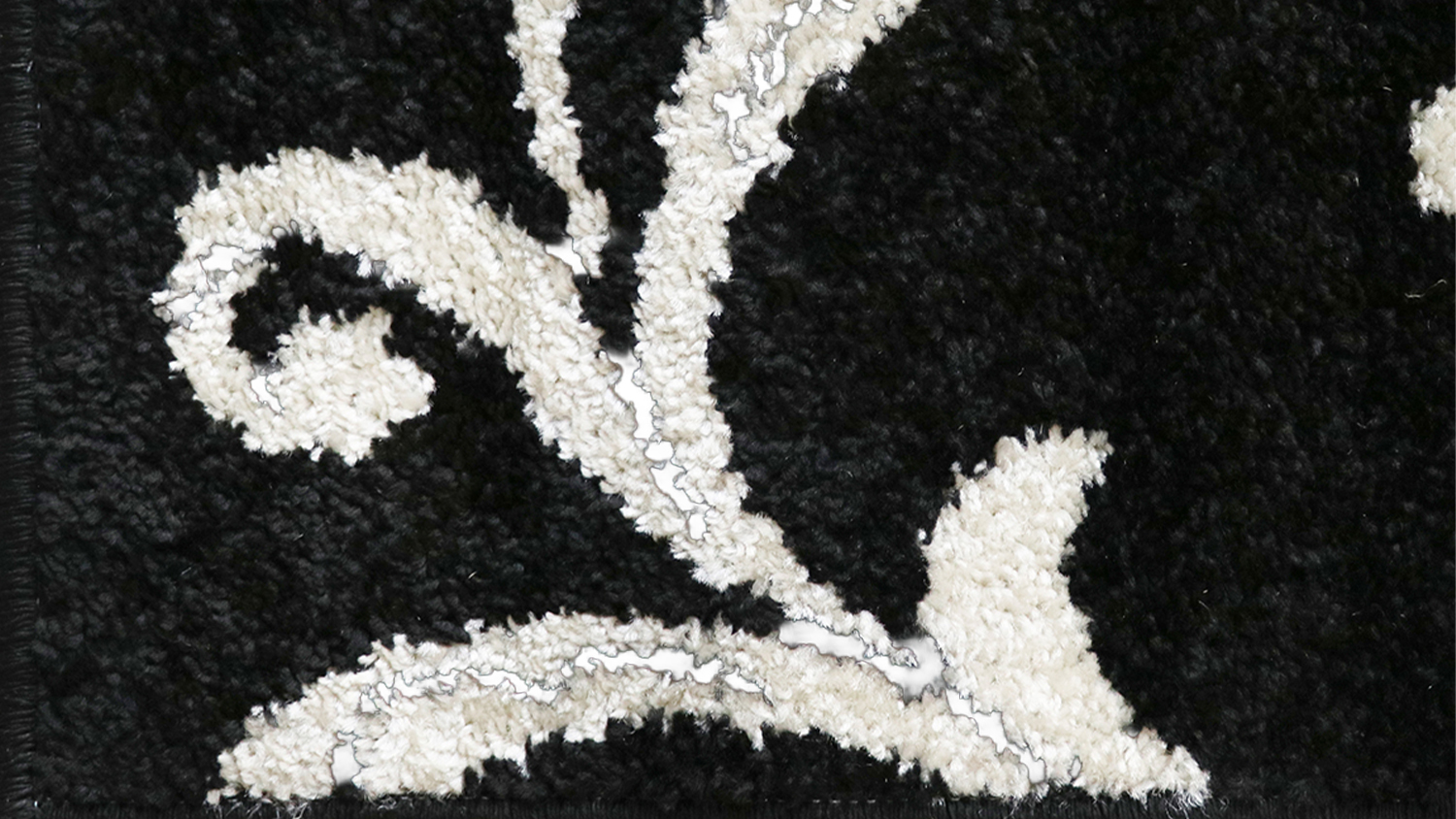 Close-up of Alyssa Rug showing its abstract design in dark and light shades