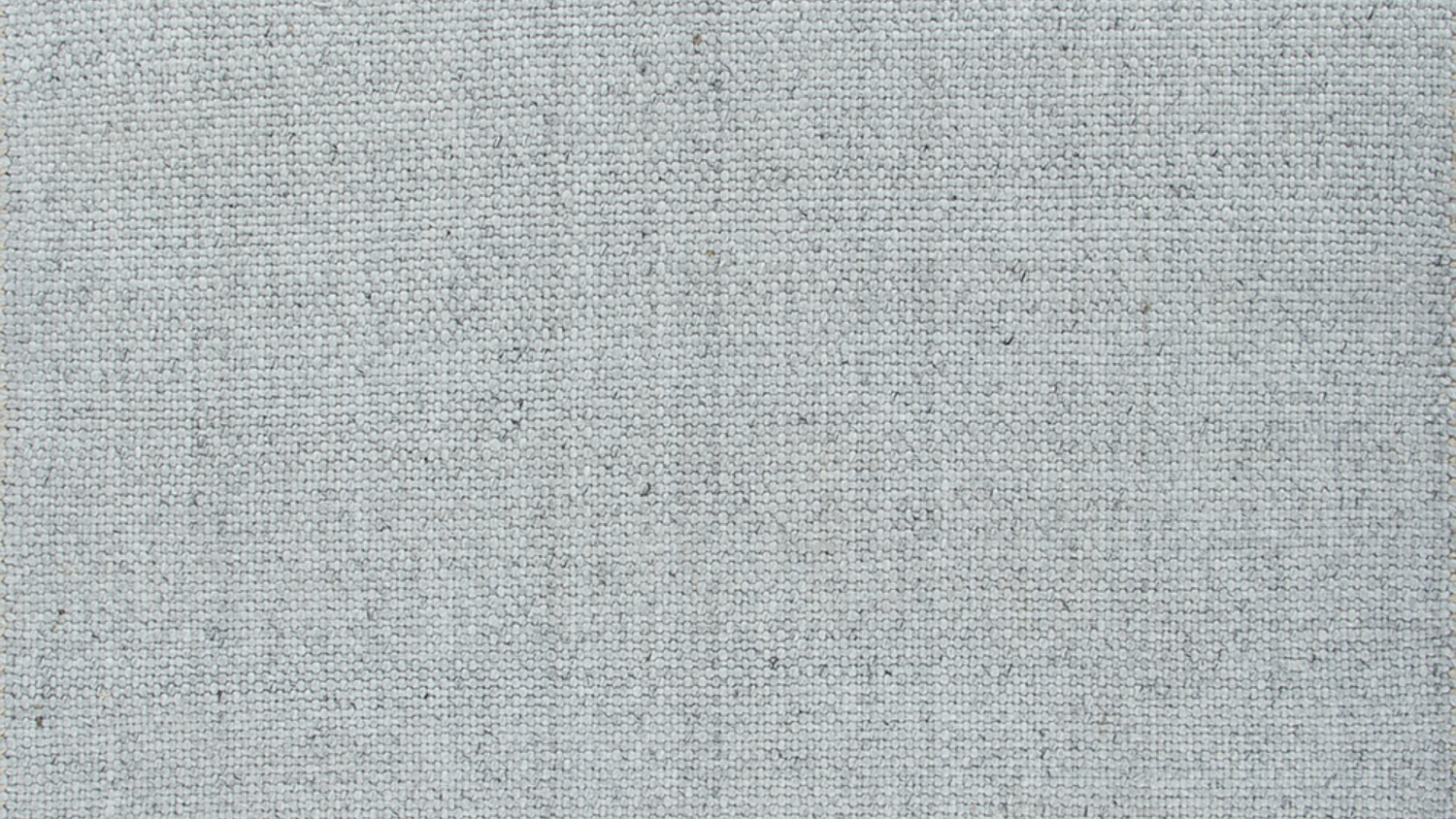 A picture of a silver hand-woven rug.