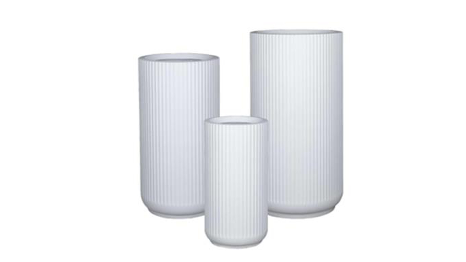 Three cylindrical planters with vertical ribbed texture, arranged by height from front to back in a staggered layout.