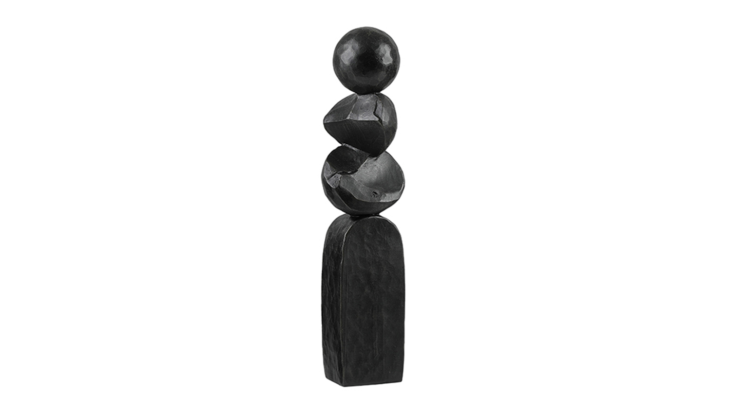 A detailed view of a tall, black, decorative sculpture with abstract shapes stacked on top of a pillar