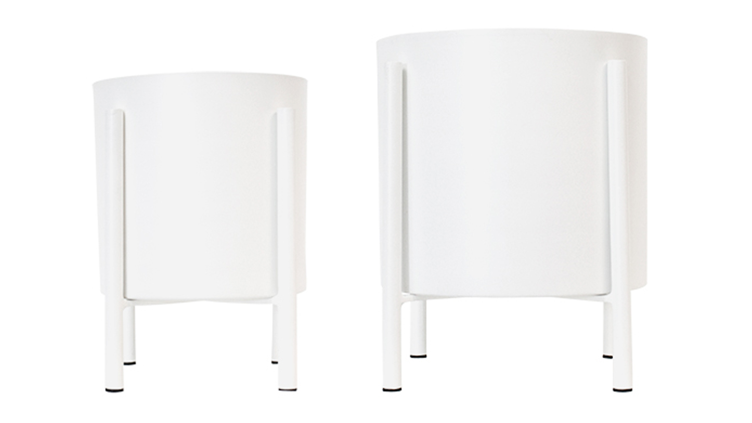 A pair of minimalist planters on metal stands, featuring a clean white design