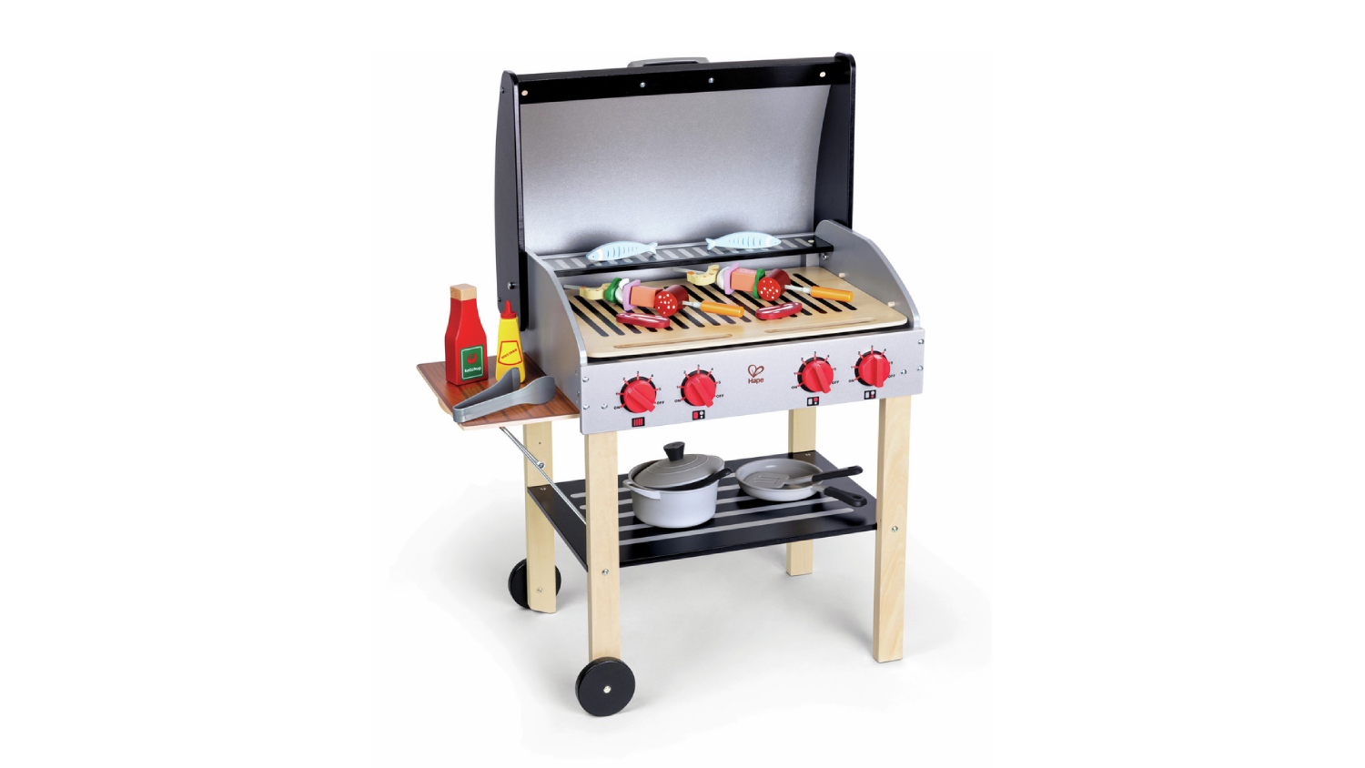 A toy grill playset with a silver lid and four red knobs on the front.