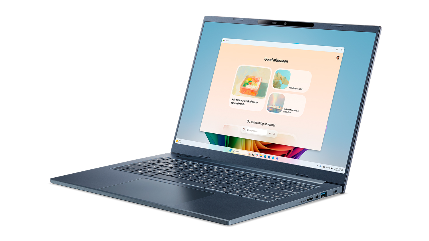 A modern blue laptop shown at a slight angle, facing left.