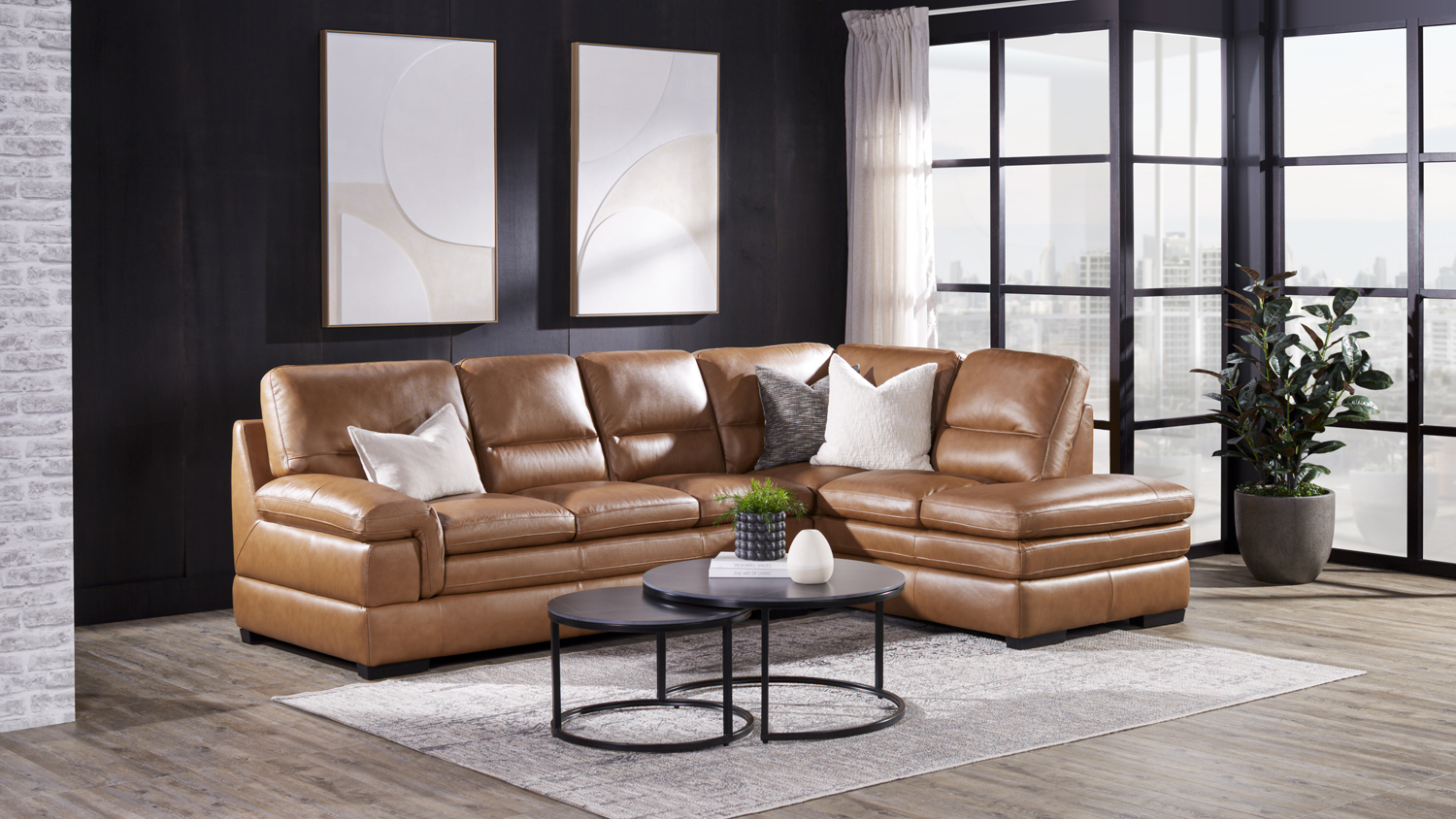 Angled view of the brown leather sectional sofa, highlighting the extended chaise lounge