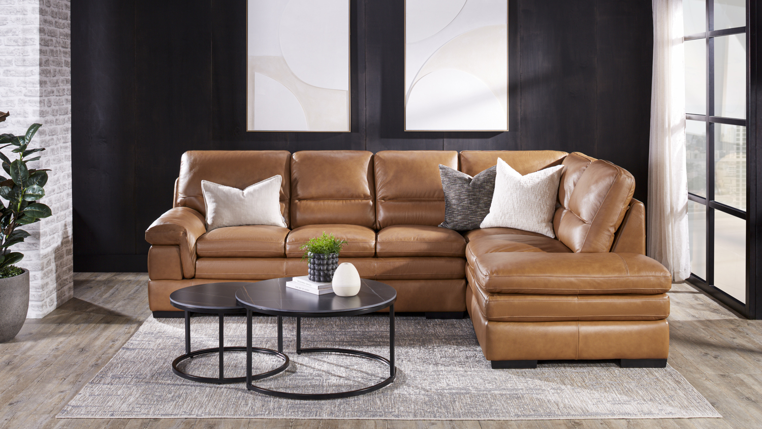 Biscoff-coloured leather sectional sofa with a right-side chaise lounge, featuring plush cushions and padded armrests