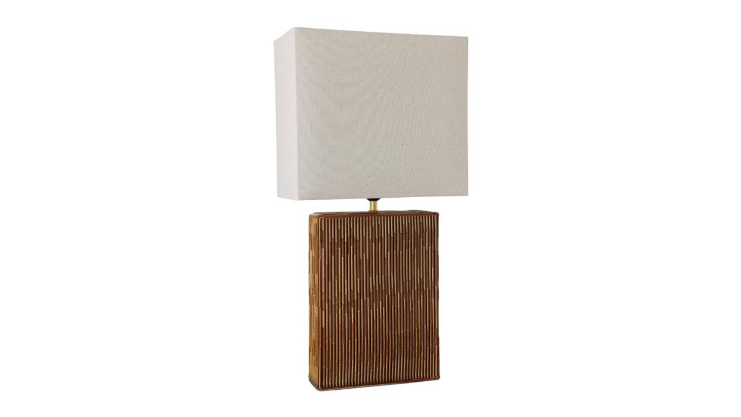 A modern table lamp with a rectangular white shade and a textured wooden base with vertical grooves