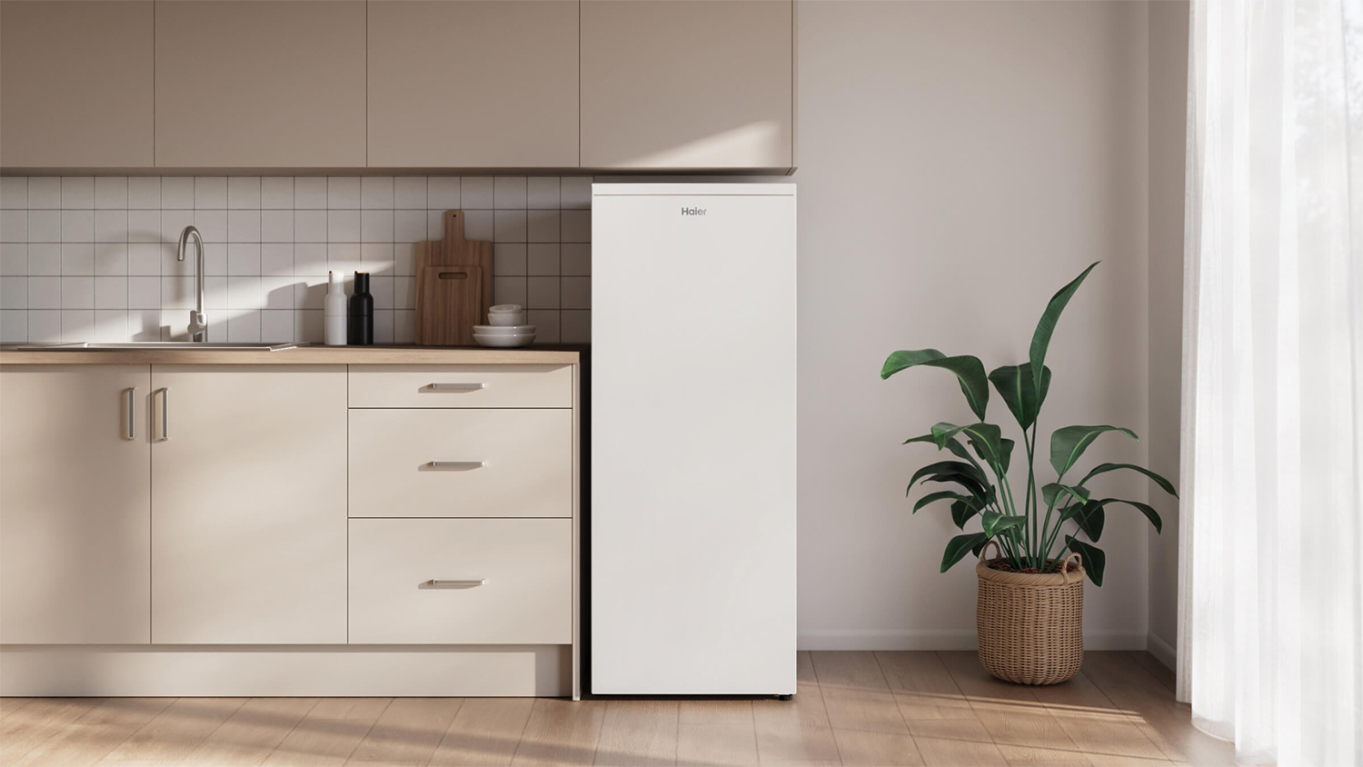 A sleek 169L freezer in a minimalist kitchen setup