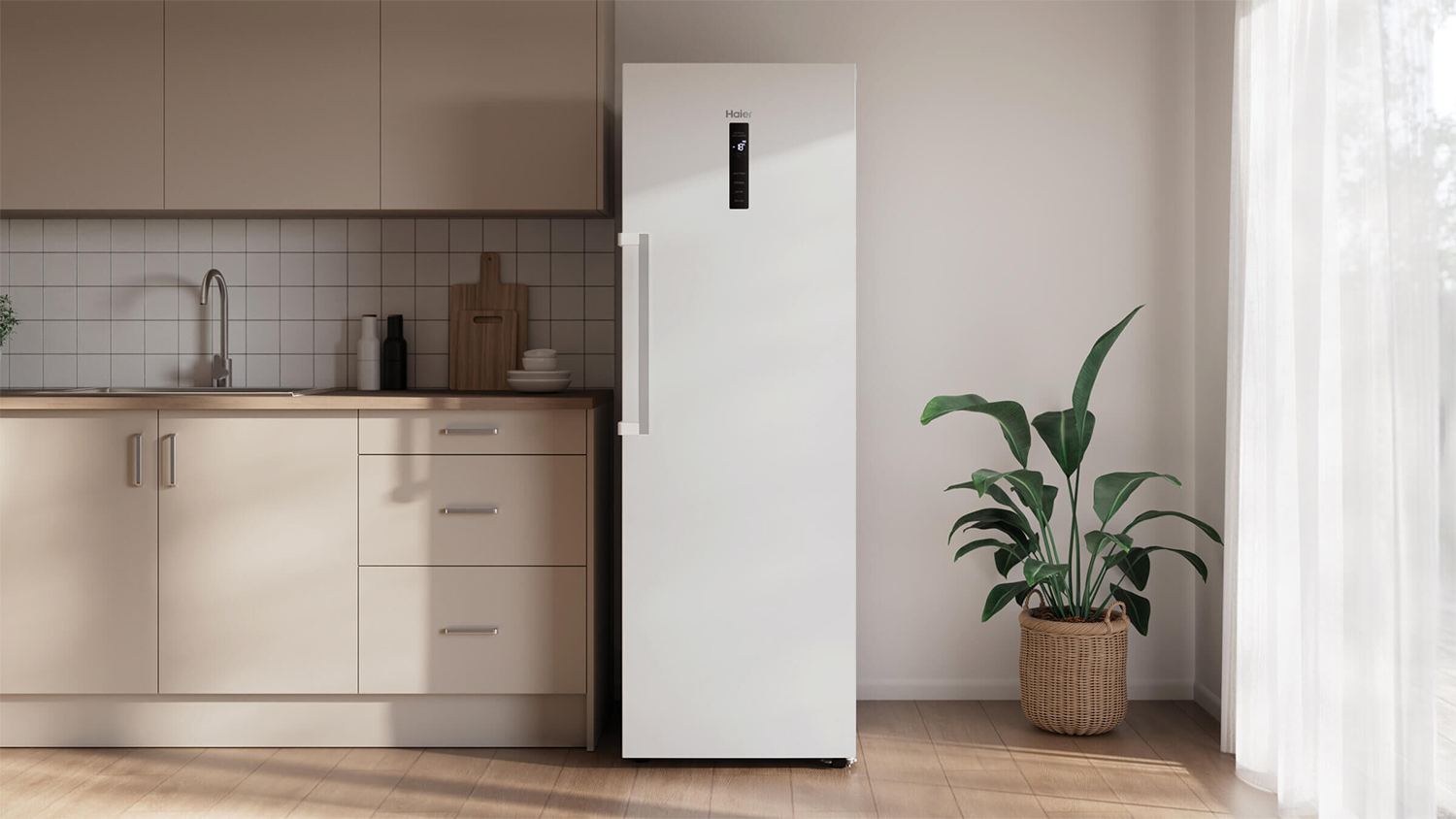 A modern white fridge/freezer in a minimalist kitchen setup