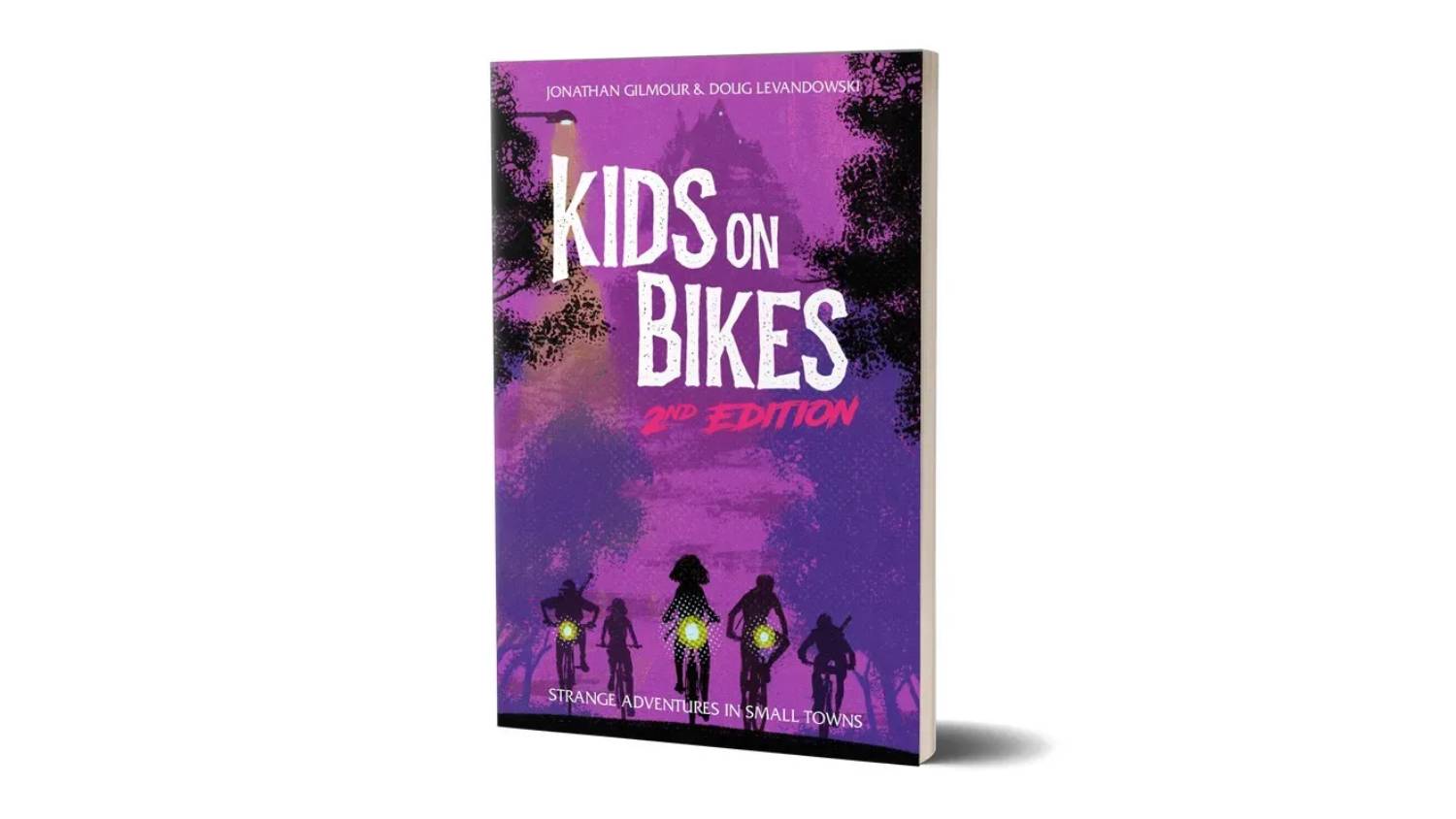 Cover of Kids on Bikes 2nd Edition showing kids on bikes with headlights, purple background