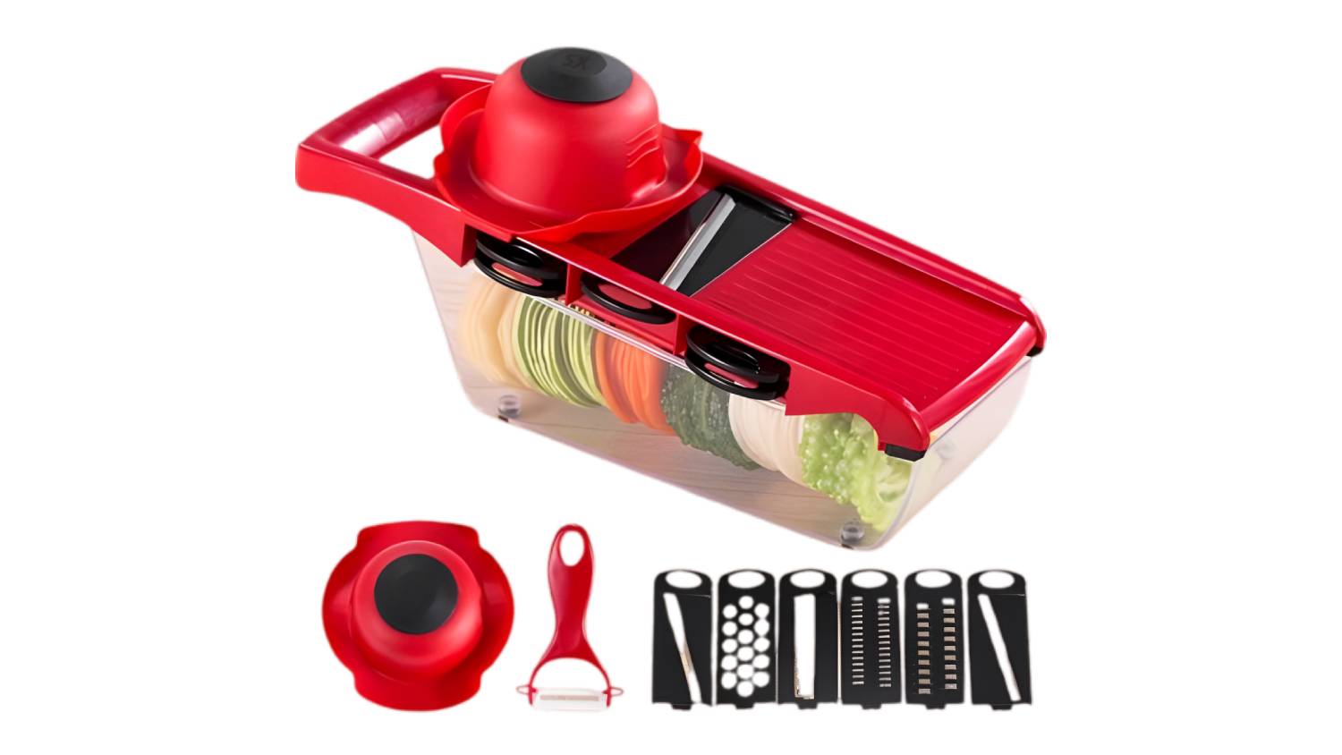 A red vegetable slicer with a container, hand guard, peeler, and multiple blades, shown with sliced veggies inside