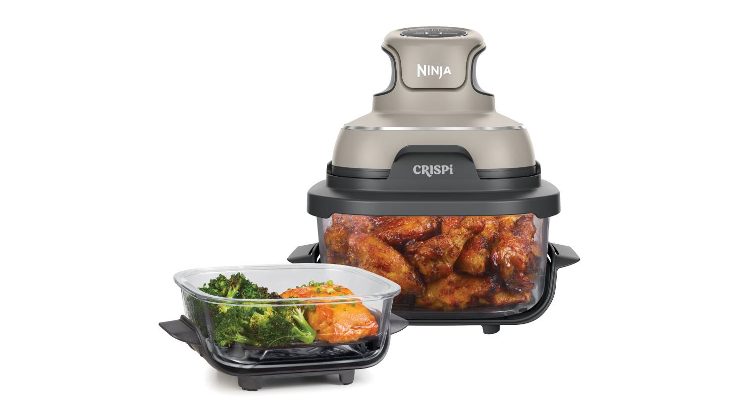 Ninja Crispi Air Fryer with cooked chicken wings inside; smaller container with broccoli and salmon in front