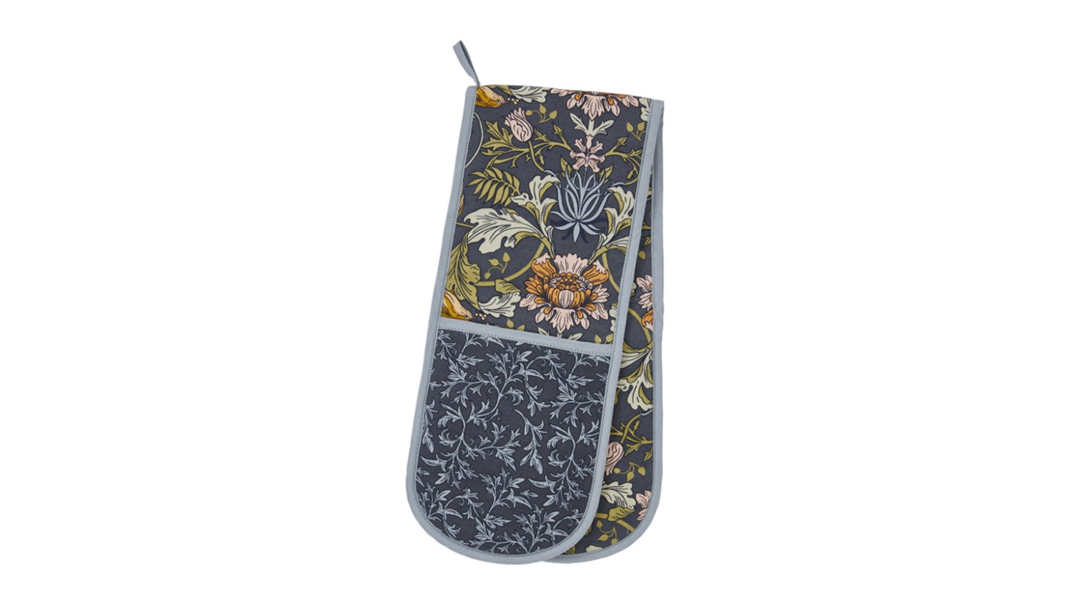 A teal oven mitt with red foxes, white flowers, and black trim