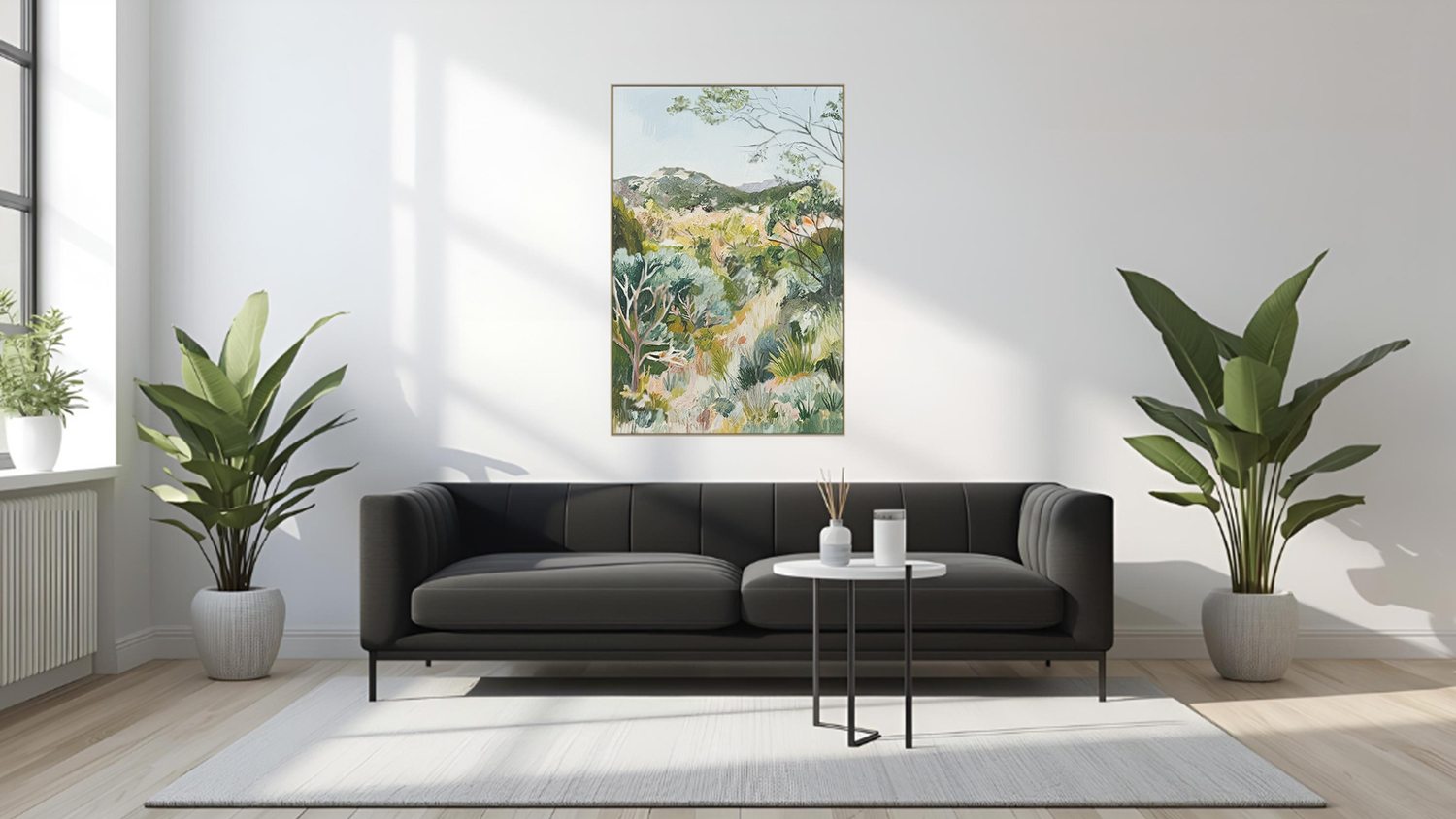 Framed photo hangs above sofa in a modern living room with wooden flooring.